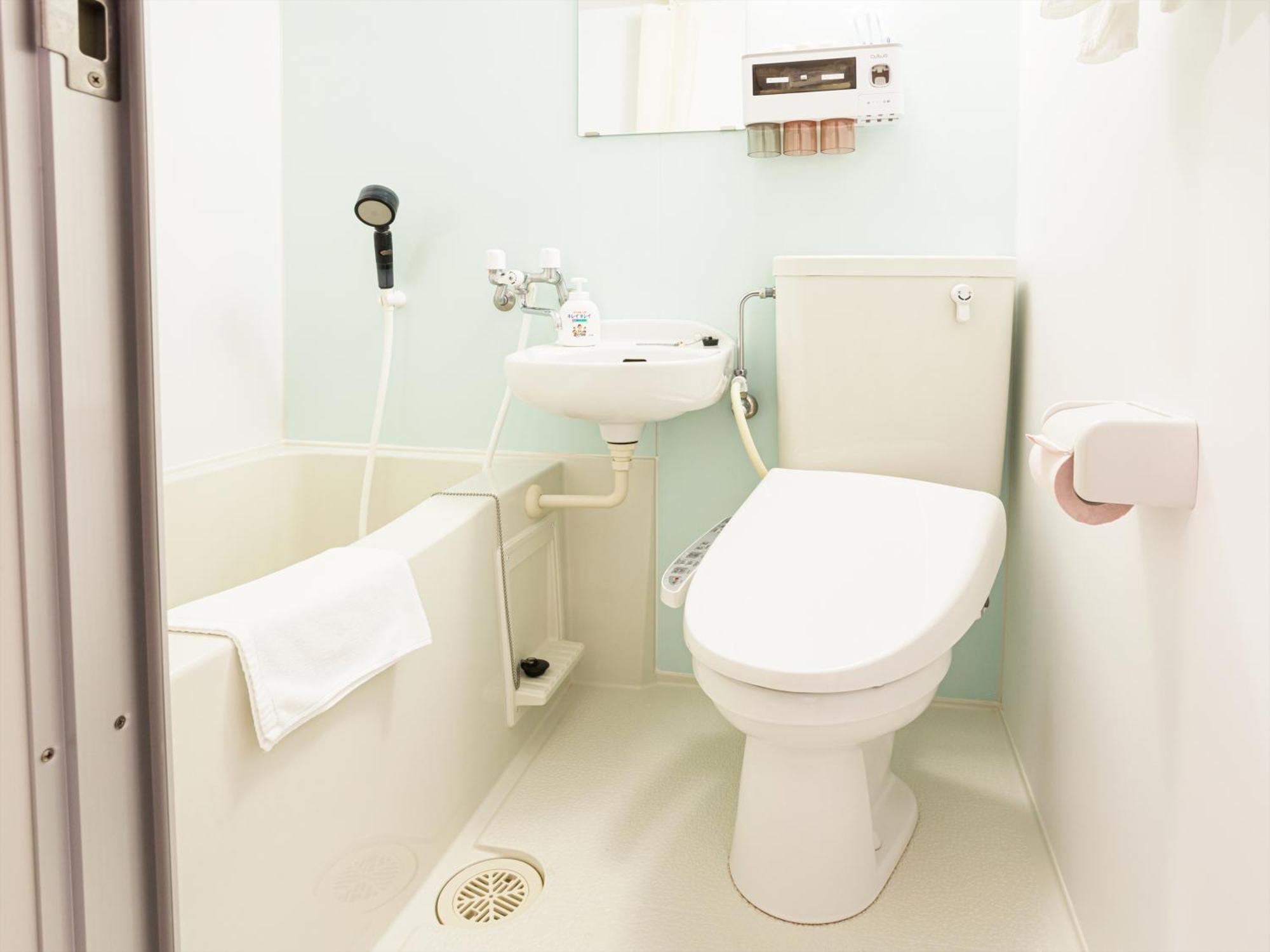 かりゆしコンドミニアムリゾート那覇スカイリビングホテル旭橋駅前 Naha Chambre photo