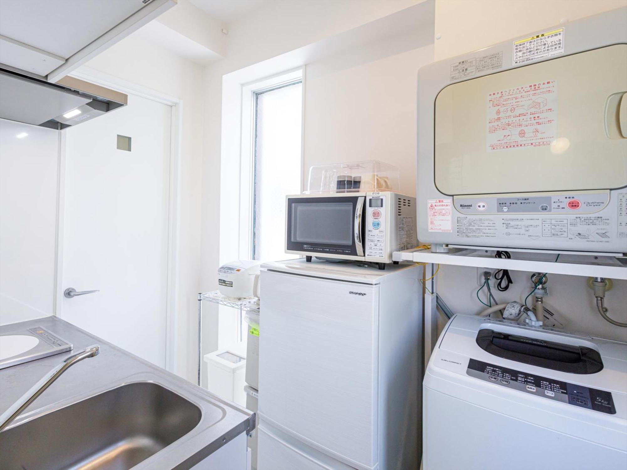 かりゆしコンドミニアムリゾート那覇スカイリビングホテル旭橋駅前 Naha Chambre photo